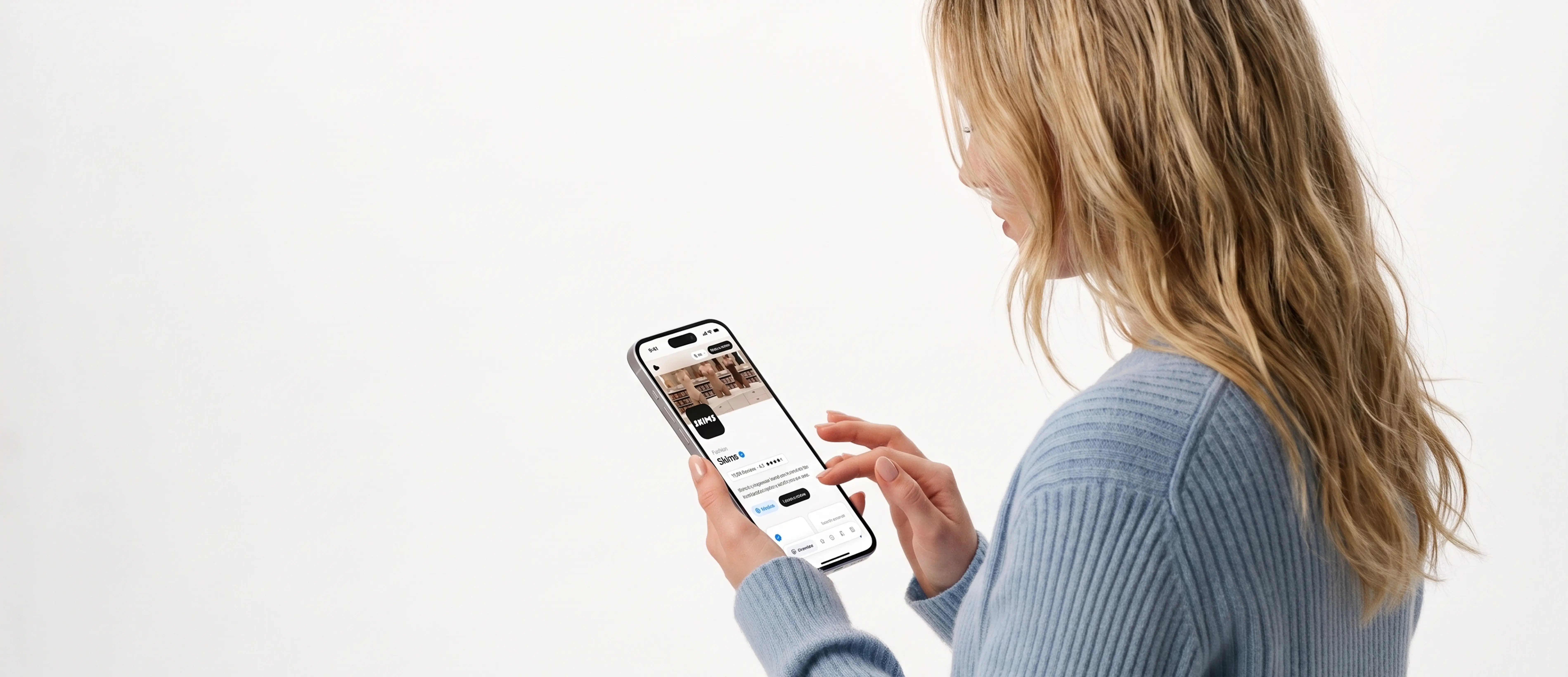 A woman reading a Welo Page on her phone